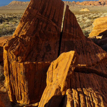 Large, red, cliff boulder in Valley Of Fire, similar to a broken hardened heart.
